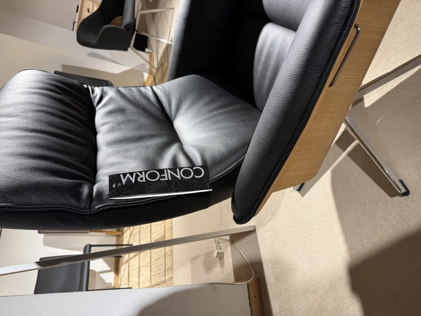 Conform Prime Sessel mit Hocker Leder